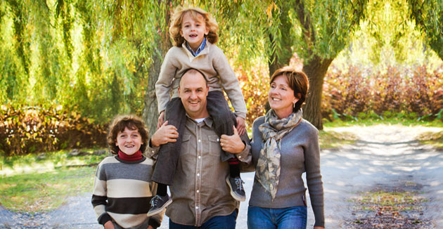 Family walking in Toogood Pond, Markham Real Estate