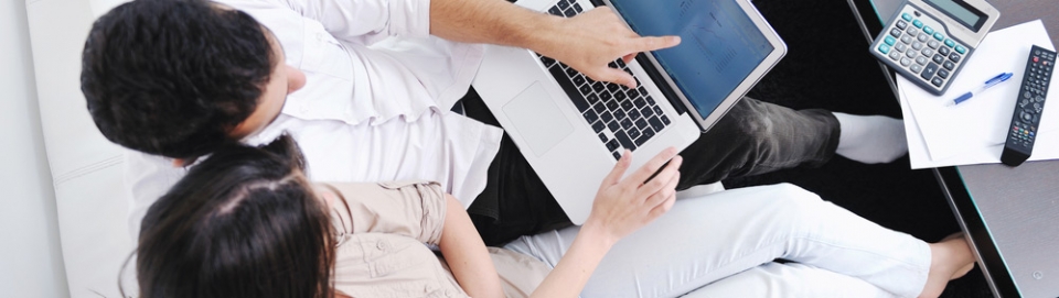 Couple On Computer Markham Real Estate